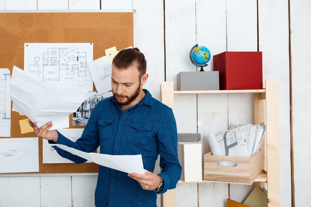property manager in his office looking at papers