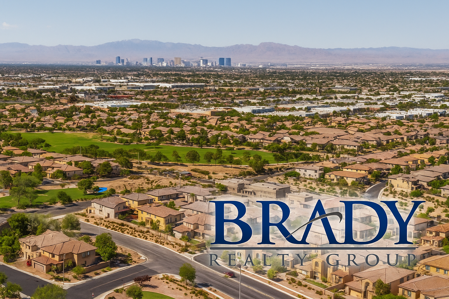 Aerial view of suburban neighborhoods in Henderson and North Las Vegas with the Las Vegas Strip in the distance, showcasing desert landscaping and modern homes under a clear sky, featuring the Brady Realty Group logo.